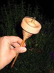 This spindle was made by the Cascade Spindle company in Washington state.  It's their &quot;Little Si&quot; model.

Besides being elegant to look at, it's an excellent spindle:  rock steady, long-sp