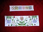 These cross-stitched bookmarks are by Karen Willett, from our 2006 Bookmark Swap.  &quot;Spring&quot; is from Annalee Waite Designs, on linen with DMC floss, and &quot;Spring in the Garden&quot; is fr