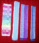 Ruth describes these lovely handwoven bookmarks as the &quot;scraps--the header, the weft experiments, the little bits woven in the middle to separate napkins or towels or whatever.&quot;  Some scraps