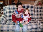 Here's Jen and Miss Taina in their Mother and Daughter sweaters complete with their blue ribbons from the fair.  The green yarn, also a blue ribbon winner, is handspun Romney.  Miss Taina's doll, a 6t