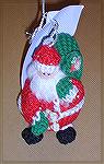 Becky's crocheted Santa is from Michele Wilson's Roly Poly Ornaments at freepatterns.com.  From our 2006 Holiday Ornament Swap.
