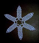 This lovely snowflake is tatted in cotton.  From our 2006 Holiday Ornament Swap.