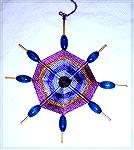 This lovely ornament is Ruth's own design.  From our 2006 Holiday Ornament Swap.