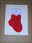 Here's Valerie's gorgeous knitted stocking.  From our 2006 Holiday Ornament Swap.