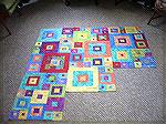 Three panels of courthouse step blocks made from bright batiks. Intended, eventually, to hang in my stairwell.

Catriona, Edinburgh