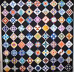 Blocks were selected to represent women in the Bible. The border will be a Celtic Knot border, designed, but not started, yet.  Mostly batiks, used some, bought more. Started in June 2005.
ConnieB/CA