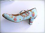 Close up of Oriental fabric shoes