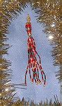 This perky beaded tassel was designed and made by Colleen Poor. She made it just for the 2008 Ornament swap.