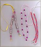These bookmarks were designed and created by Patricia Tenpenny. When placed in the book you have beads at the top and bottom of the page.

2009 Bookmark Swap
