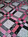 A close of the Pink & Black quilt