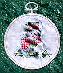 This ornament was stitched by Jackie Carey.. My ornament is called "Holiday Snowman" the designer is Sam Hawkins.
