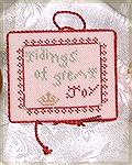 This ornament was cross stitched by Nancy Kuelbs. Design by Primitive Bettys finished as an ornament.