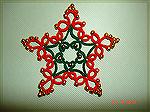 This ornament was tatted by Wend Durell. It was tatted from a Ring of Tatters pattern.