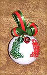 This ornament was done by Patricia Tenpenny, it was designed by Patricia also.