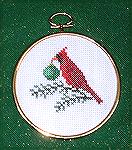 This Cardinal ornament was stitched by Jackie Carey. It's from the "Cross Stitch 1999" book.