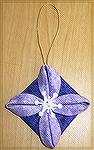 This ornament was fused together with wonder under and there was no stitching. It was made with a 5 inch circle.
Kyra