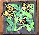 This is a Butterfly shadowbox I made using my Silhouette Cameo cutter. Each of the background colors is a different cut. The butterflies are glued on top of some of the layers.
Kyra