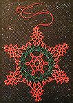This snowflake is tatted from a pattern by Jennifer Williams. It was tatted by Wendy Durell.
