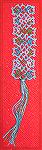 This bookmark was tatted from a necklace pattern designed by Jennifer Williams. It was tatted by Wendy Durell.