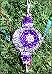 This ornament was made by Katie McMillan. It was made from a Herrschners ornament kit.