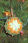 This ornament was made by Jackie Carey . It is a no sew quilted ornament.