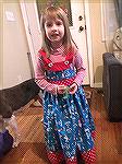 This Cat in the Hat dress was made for Dr. Suess day at pre-school. Katie downloaded the pattern offline and made a few changes and made the adorable dress.
Kyra