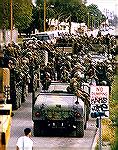 Here's the Los Angeles in 1992 deployment of National Guard troops, at a staging area. Ordered by Prez George H W Bush, under the Insurrection Act. Image from May 3, 1992 -- Karen Tapia / Los Angeles 