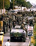 Here's the Los Angeles in 1992 deployment of National Guard troops, at a staging area. Ordered by Prez George H W Bush, under the Insurrection Act. Image from May 3, 1992 -- Karen Tapia / Los Angeles 