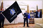 The U.S. Space Force is a new branch of the Armed Forces, established on December 20, 2019.  Its new flag design is being displayed, during President Trump's White House ceremony.    