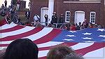 Records of Ft McHenry indicated that the flag that flew there was 42 feet long and 30 feet high, with each stripe being about two feet wide.   Huge.   Here's people who assisted in unfurling the big f