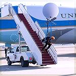 funny cartoon showing biden supported by the Chinese spy baloon as we descends from AF ONE.